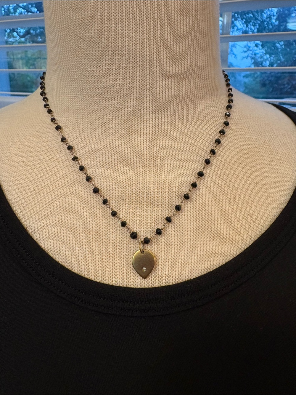 Black Beaded Necklace with Gold and Zircon Pendant